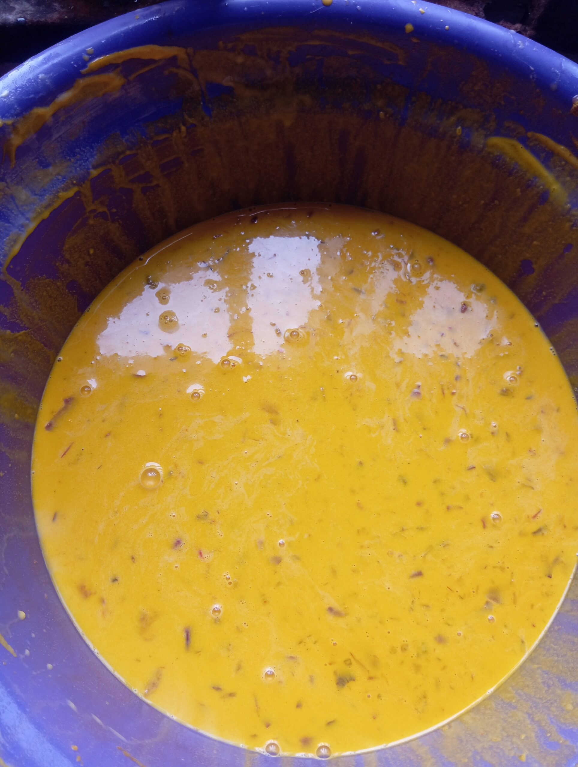okpa batter mixed with ingredients