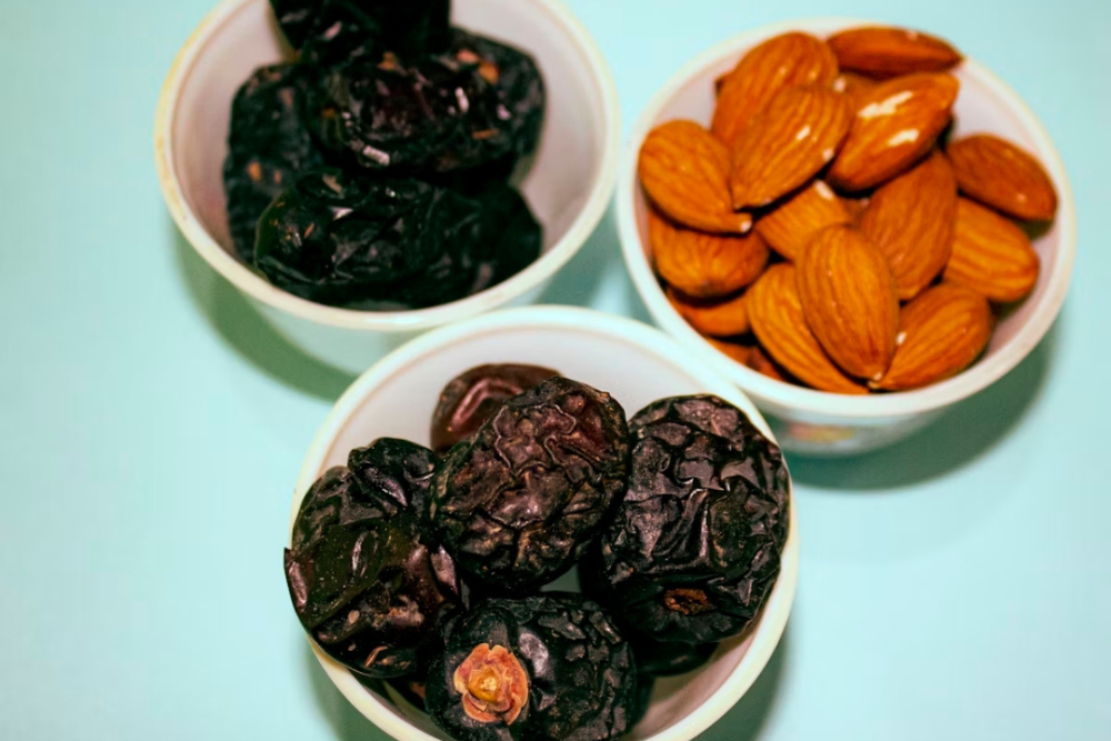 Dark chocolate with almonds, a rich low calorie healthy dessert you can enjoy guilt free.