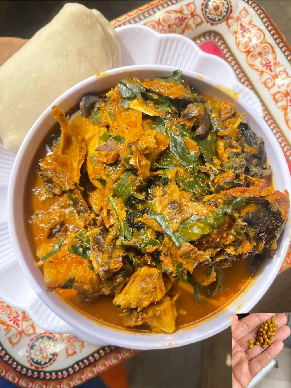 Uziza soup with palm fruit extract and ogiri